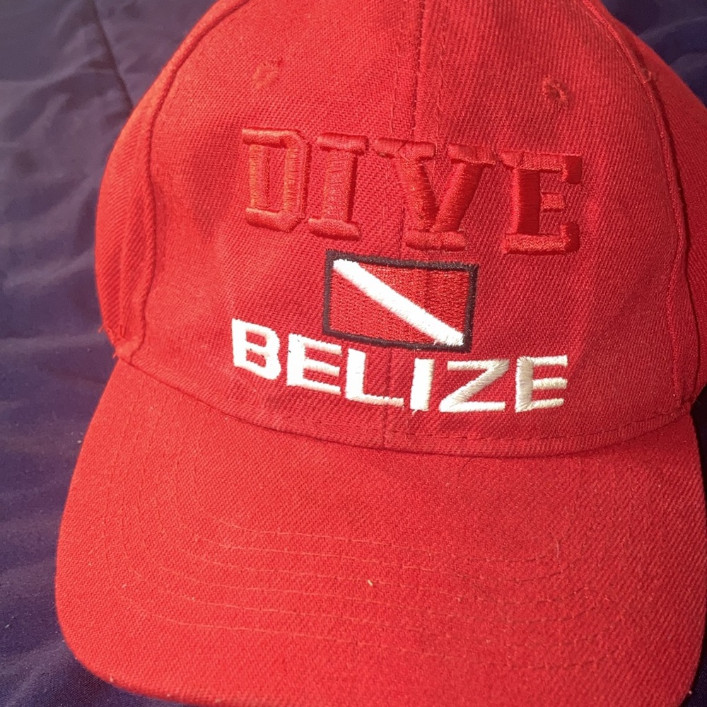 Belize Dive hat from the cliffs of Belize